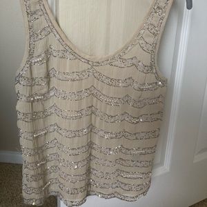 Beautiful beaded and sequin waist length top.